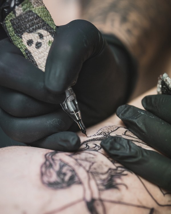 Tattoo work by Miami Ink